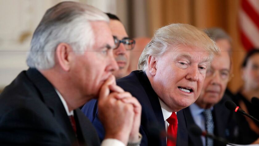 Secretary of State Rex Tillerson, left, and President Trump at Mar-a-Lago in south Florida on April 7.