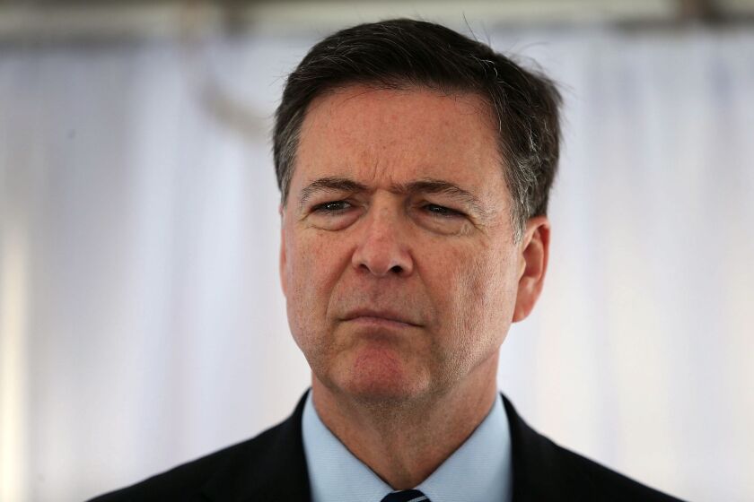 FBI Director James Comey, shown in Florida last week, said Thursday that the unspecified sum the bureau paid a third party to unlock an iPhone used by one of the San Bernardino shooters "was worth it."