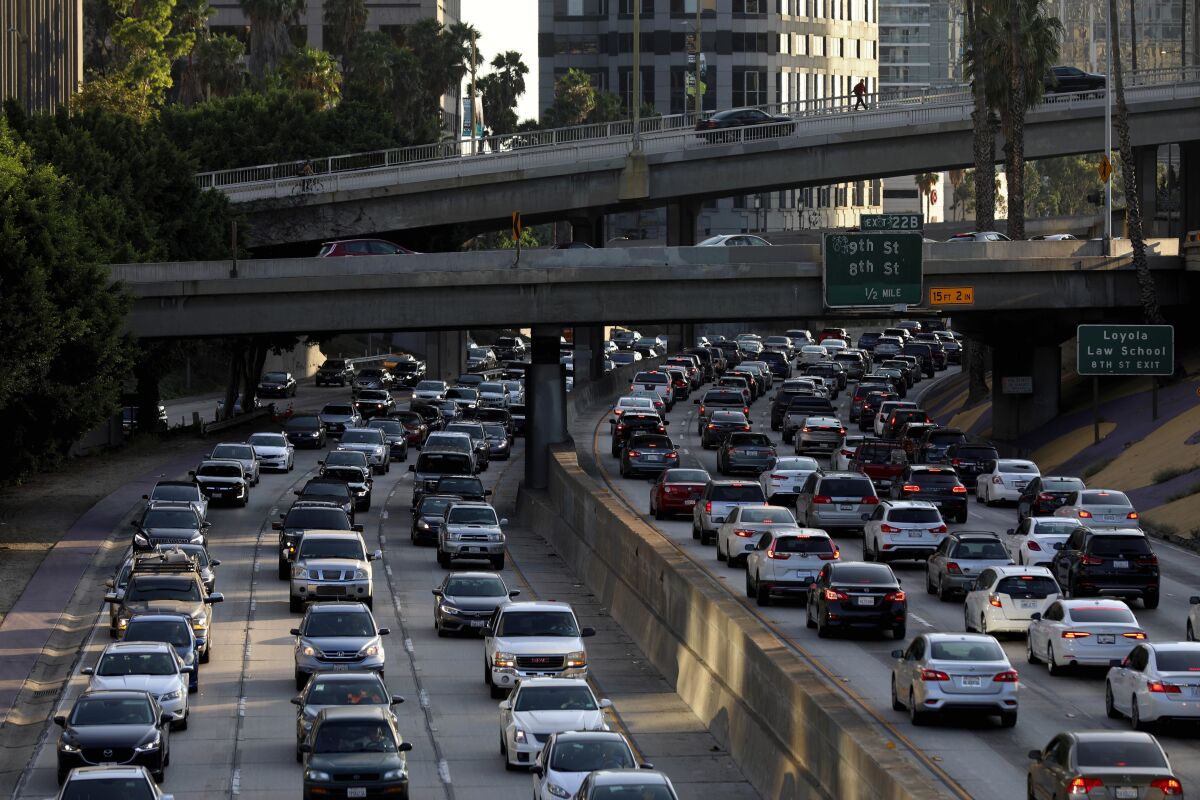Cars in traffic on the 110 Freeway through downtown Los Angeles.