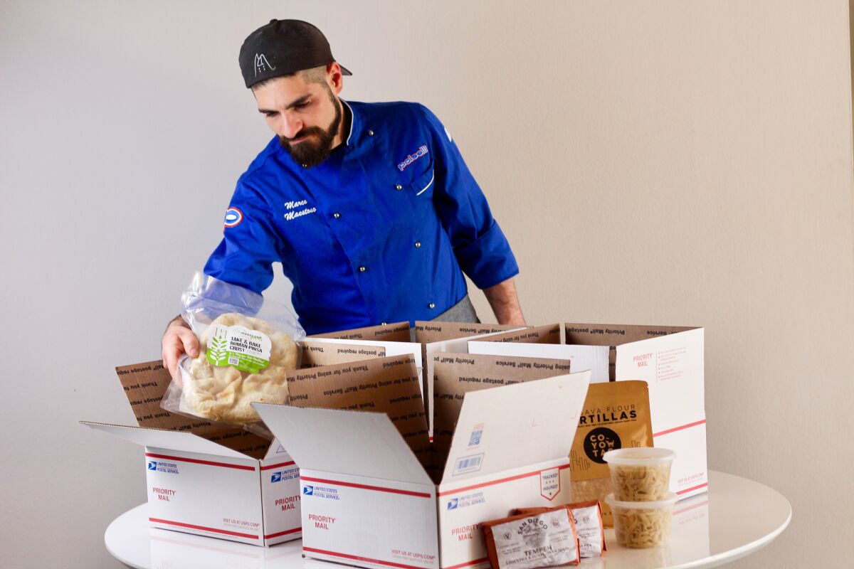 San Diego chef Marco Maestoso packs locally made food items for his newly launched Craft Box program.