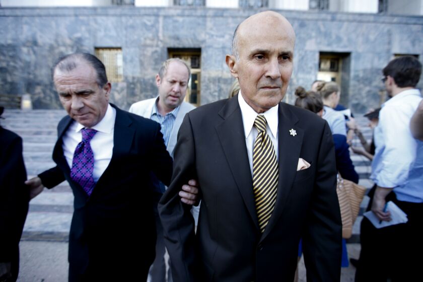 Former Los Angeles County Sheriff Lee Baca leaving U.S. District Court in February.