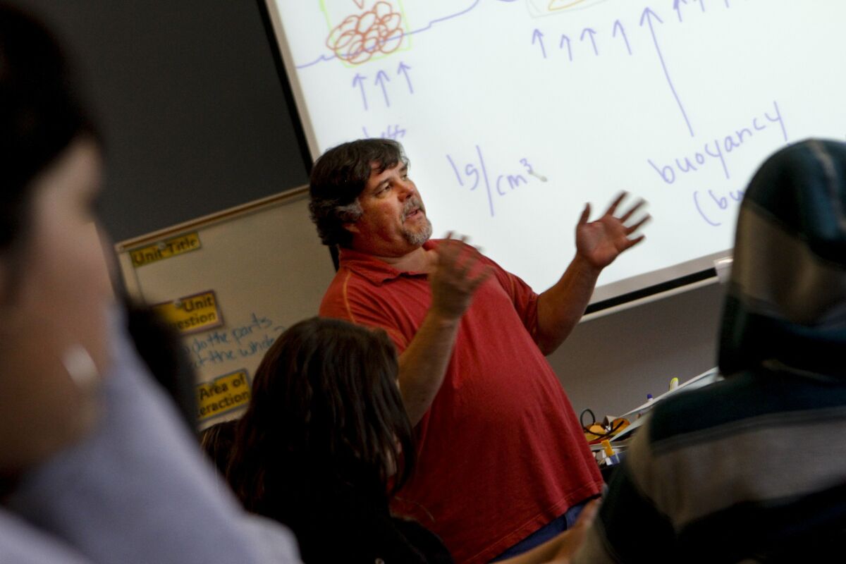 Science teacher John Laird lectures in his classroom at Fedde Middle School in Hawaiian Gardens in 2011.