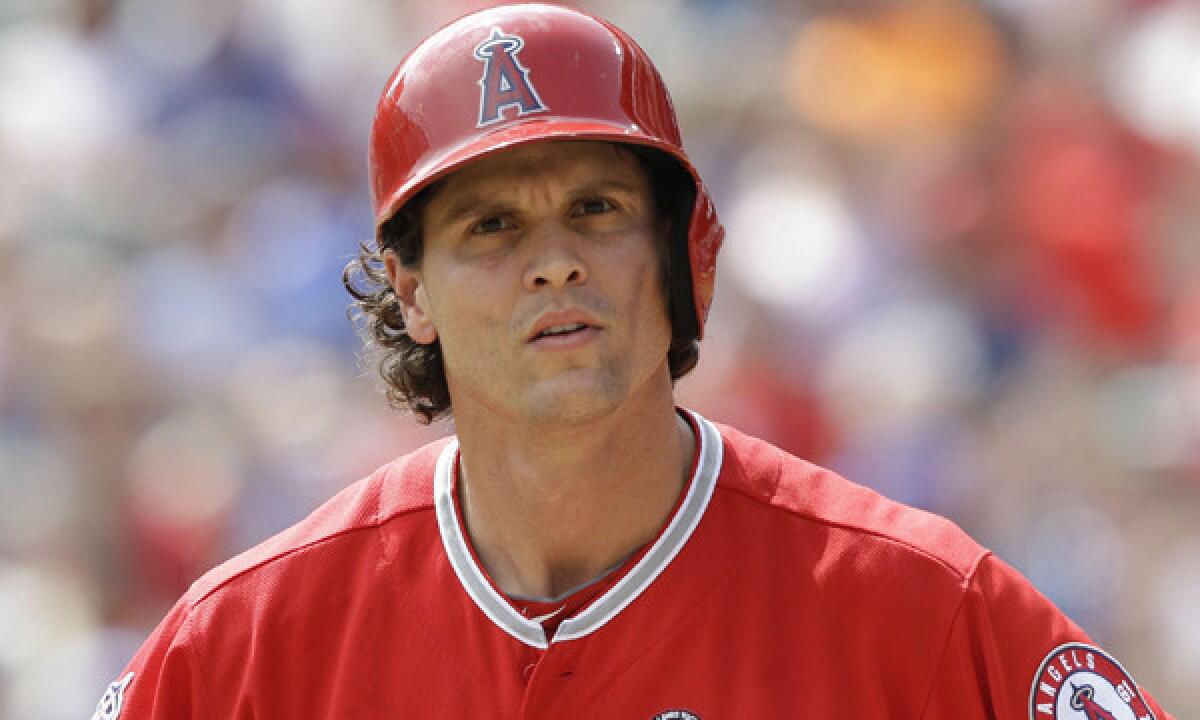 Angels infielder Grant Green looks toward the dugout during an at-bat against the Texas Rangers on Sept. 28. Green is hoping to make the Angels' opening day roster.