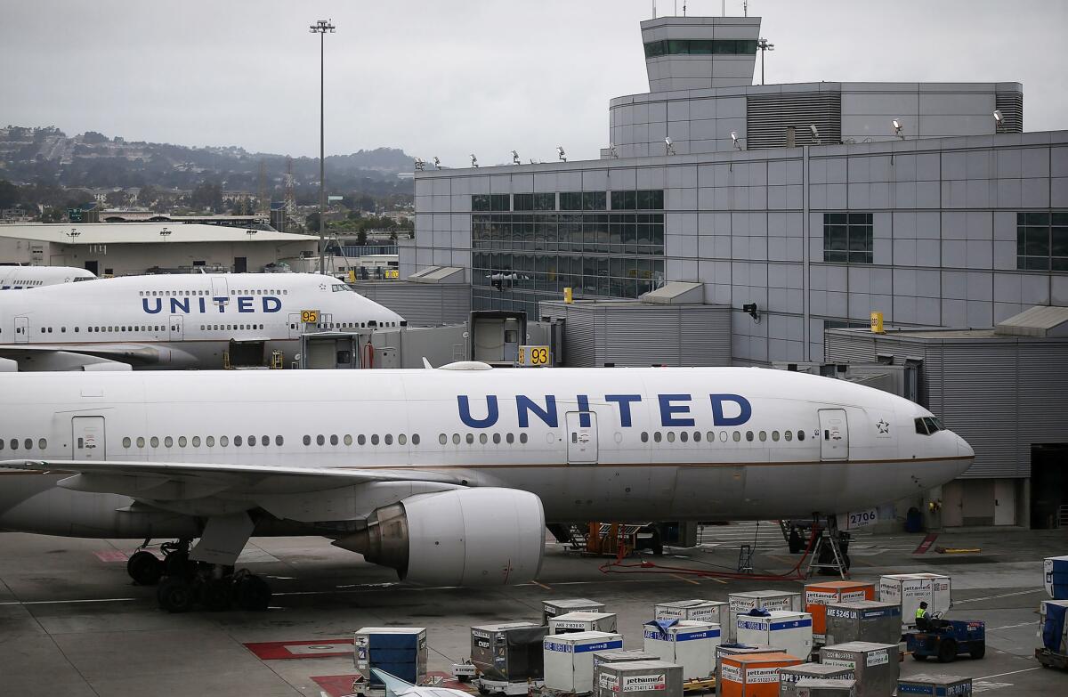 United Airlines planes sit on the tarmac at San Francisco International Airport in July 2015.