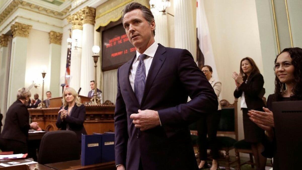 Gov. Gavin Newsom receives applause after his first State of the State address Tuesday in Sacramento.