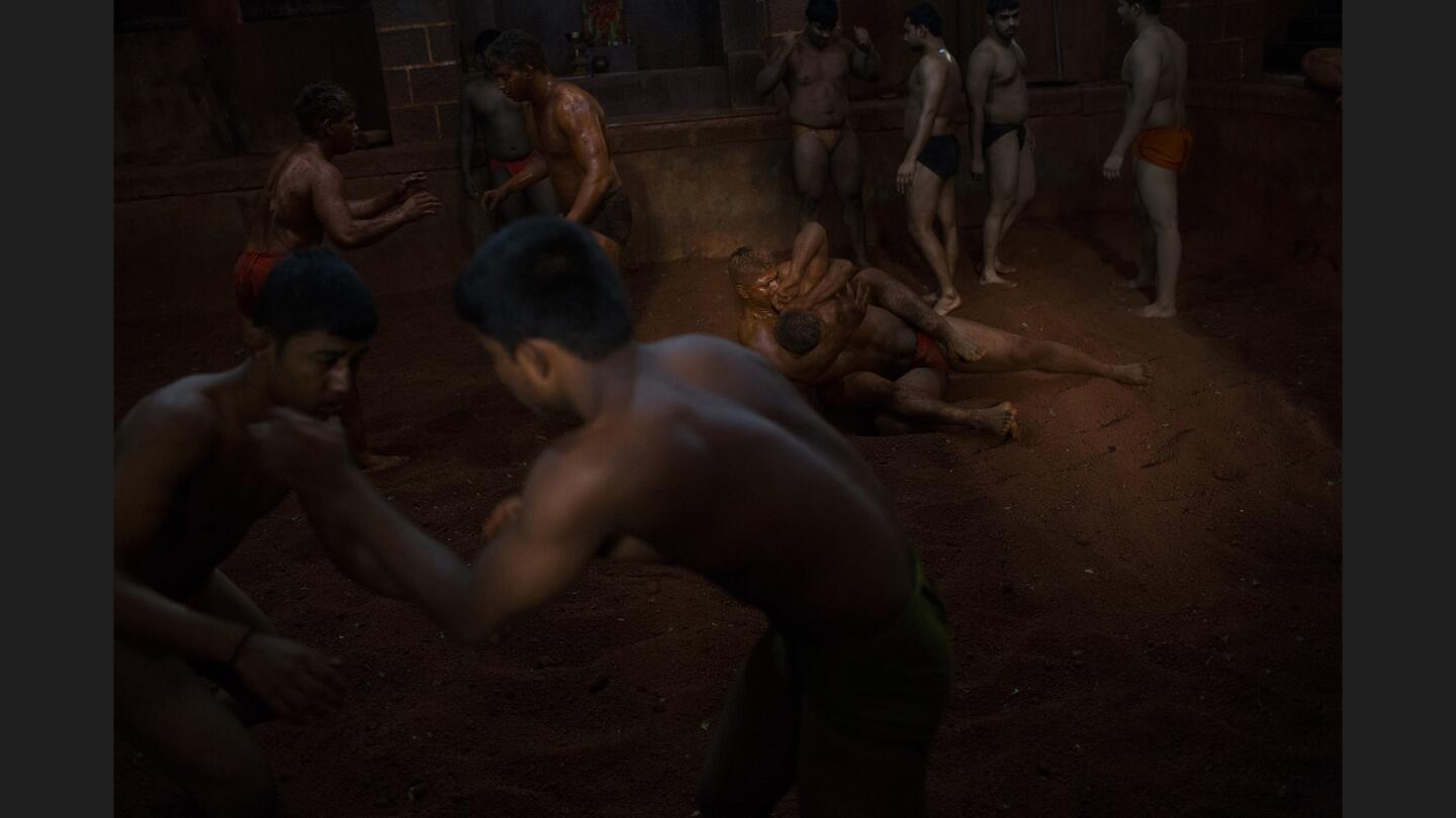 Kushti wrestlers train in the western Indian city of Kolhapur. "The last five generations of my family have all practiced kushti," one wrestler says. "If I have a son, he will also be a wrestler."
