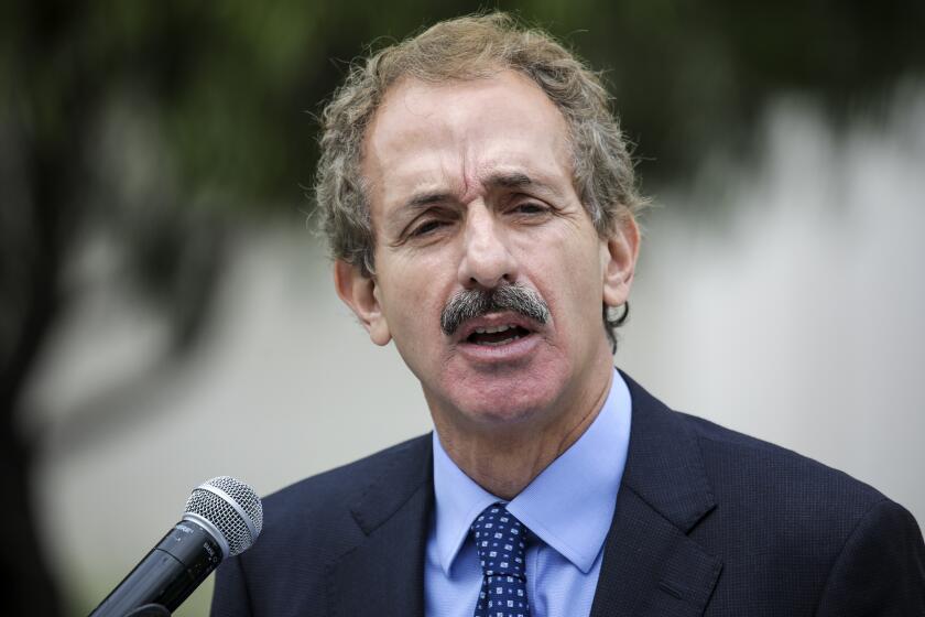 Los Angeles, CA - August 31: Los Angeles City Attorney Mike Feuer, who is running for mayor in 2022, in response to a Los Angeles Times story on police overtime, holds a news conference in front of LAPD Headquarters on Tuesday, Aug. 31, 2021 in Los Angeles, CA. (Irfan Khan / Los Angeles Times)