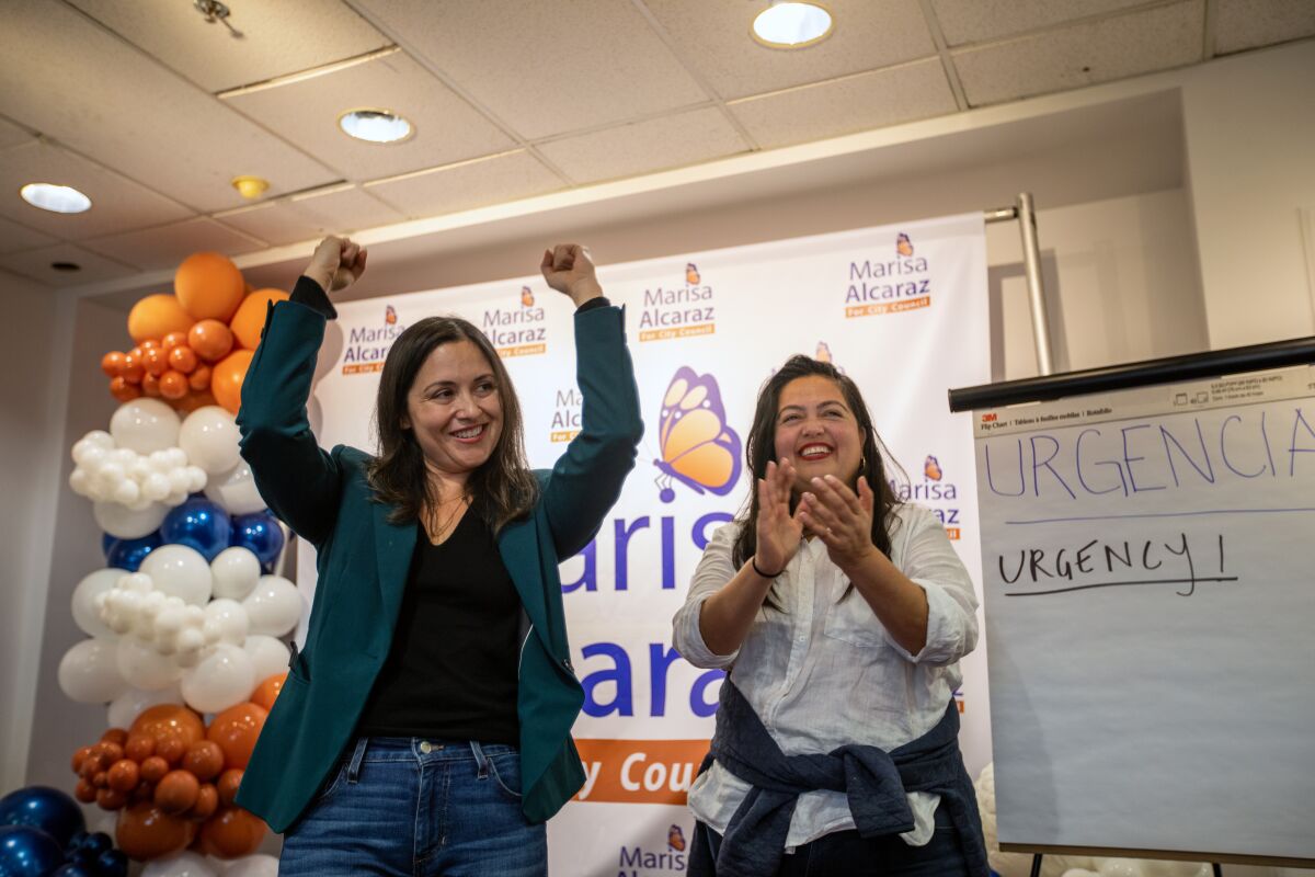 Marisa Alcaraz and Assemblywoman Wendy Carrillo fire up a group of Alcaraz's volunteers. (Francine Orr / Los Angeles Times)