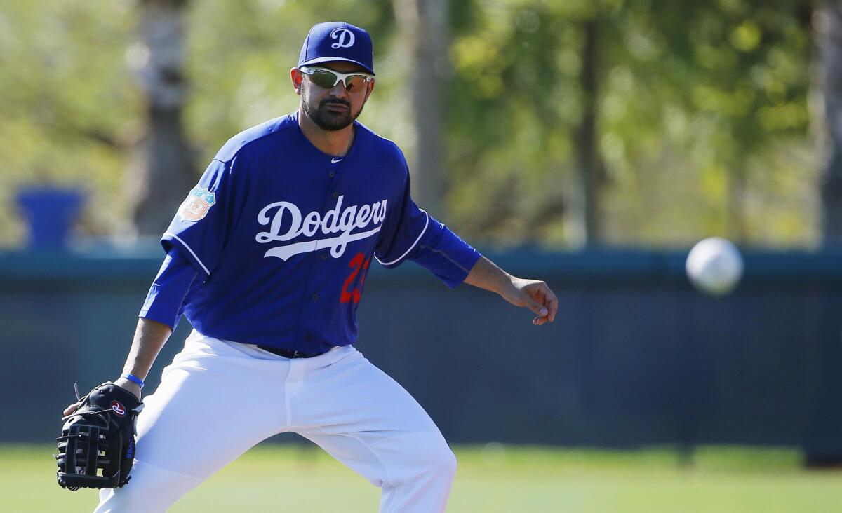 Dodgers first baseman Adrian Gonzalez watches a line drive head in his direction during a spring training workout on Feb. 26.