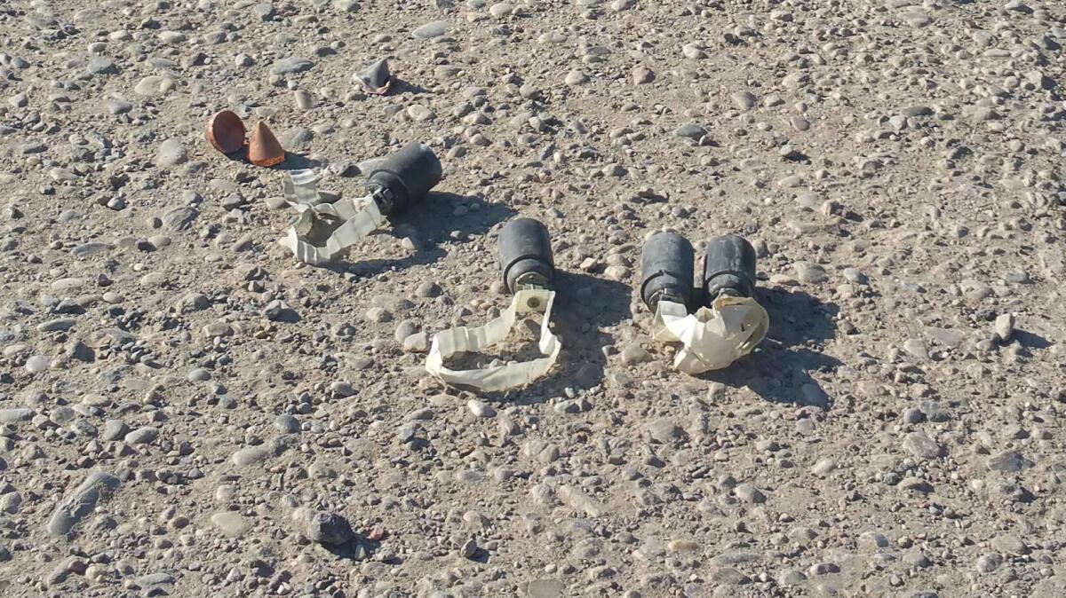Unexploded cluster bomblets after an Islamic State attack on security forces near Mosul, Iraq.