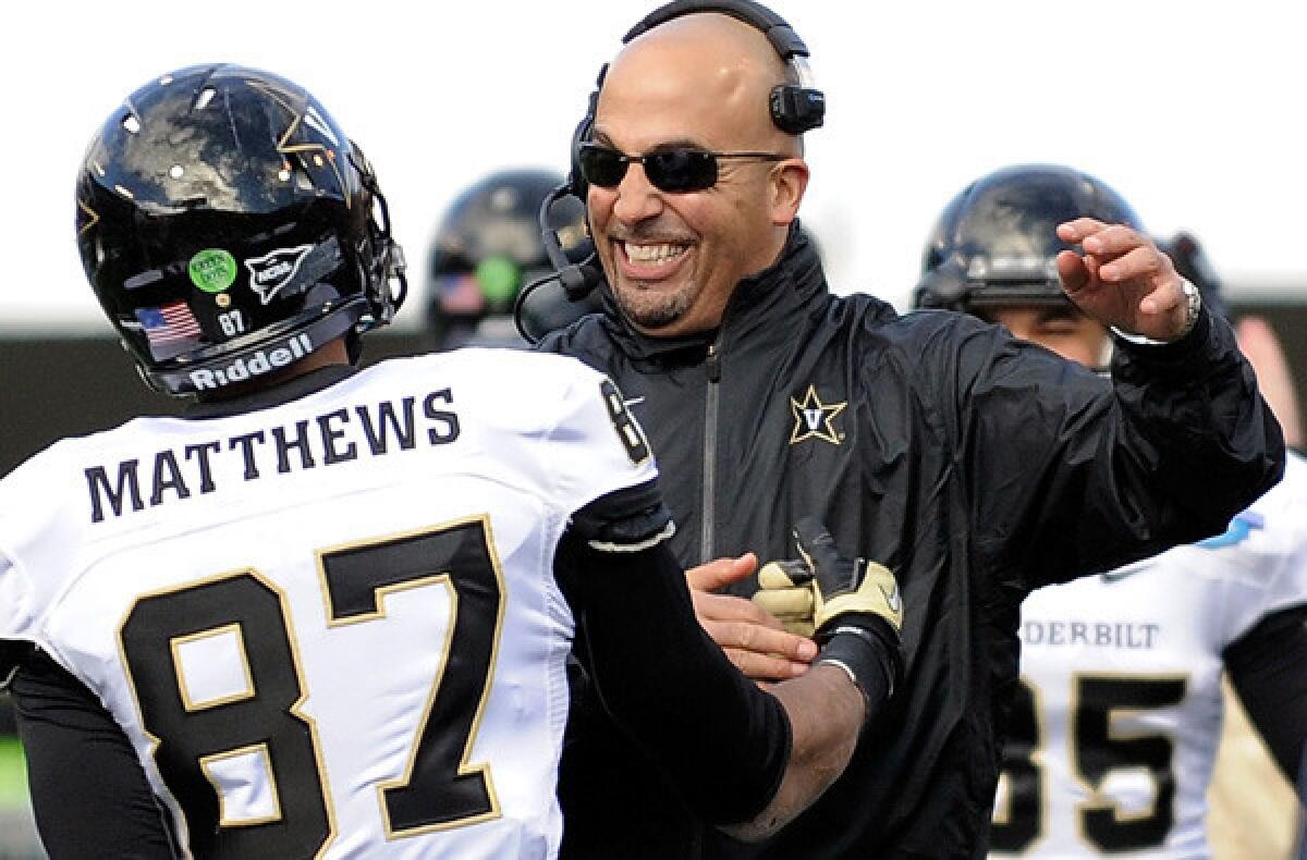 James Franklin celebrates a touchdown with Vanderbilt receiver Jordan Matthews during the BBVA Compass Bowl.