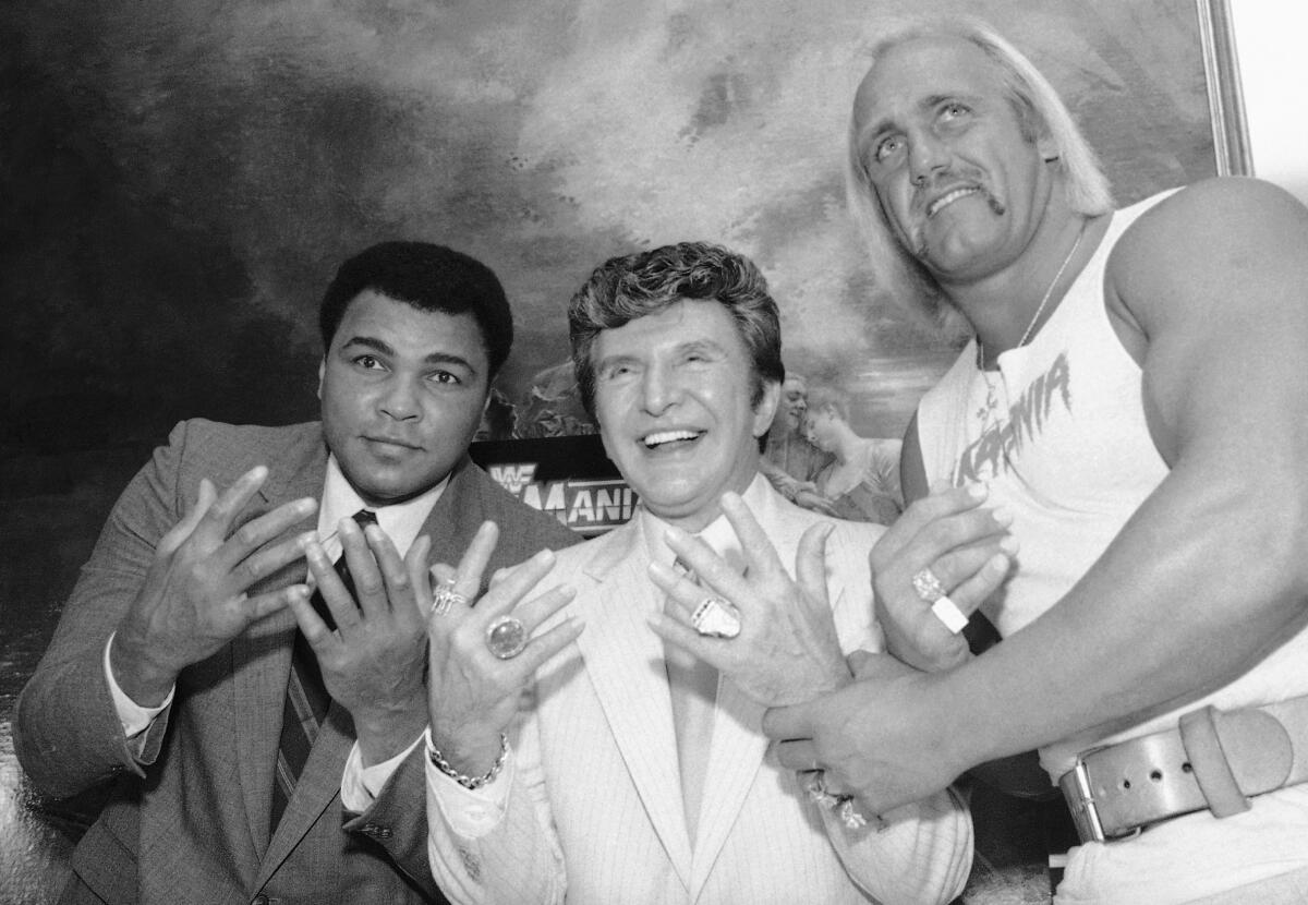 Muhammad Ali, Liberace and Hulk Hogan pose together at Madison Square Garden