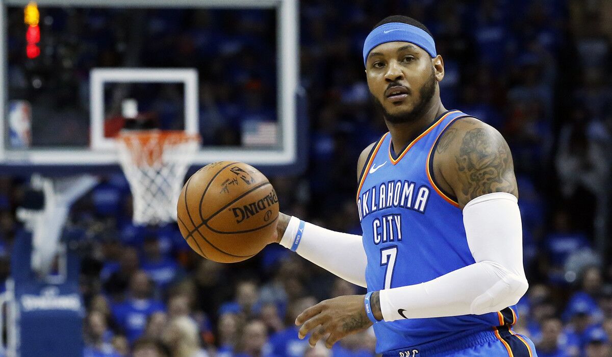Oklahoma City Thunder forward Carmelo Anthony dribbles during a game in 2017.
