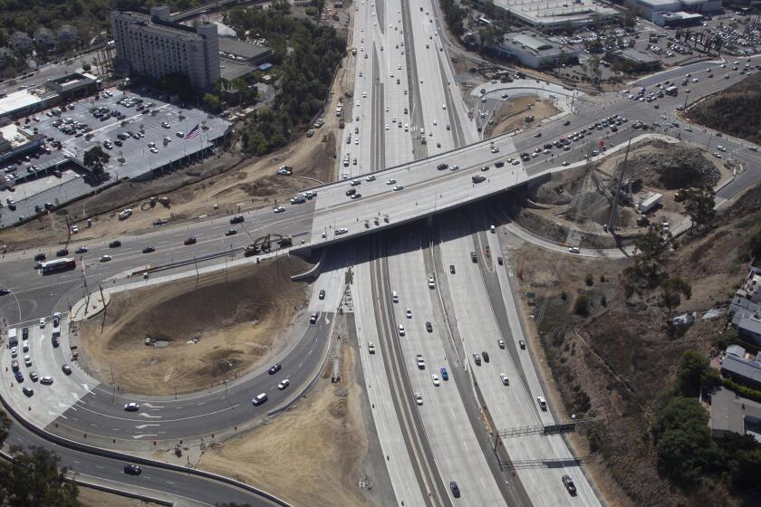 Officials promise that the work on the SR163 and Friars Road interchange will be completed by the holiday shopping season. Photo made during a photo flight on Friday, October 18, 2019