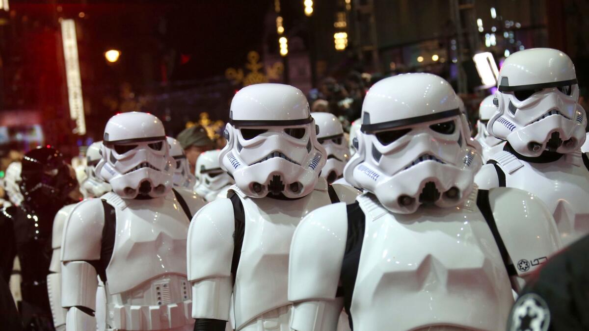 Stormtroopers march in formation at the European premiere of the film "Star Wars: The Force Awakens" in London in 2015.
