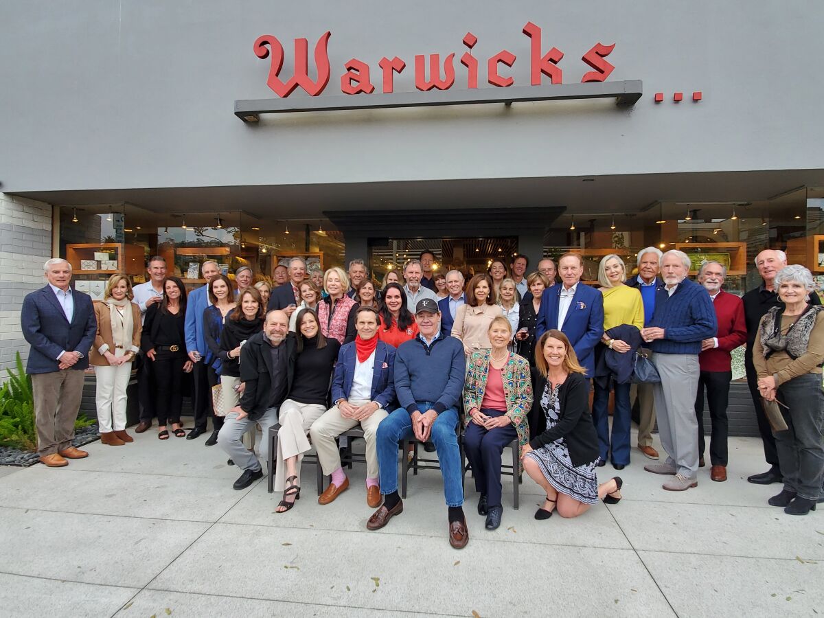 Warwick’s bookstore last May celebrated its new lease and investors in its building at 7812 Girard Ave.