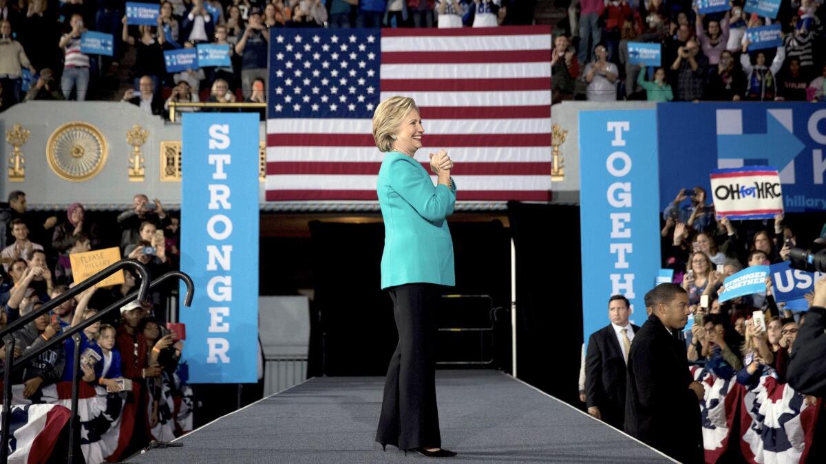 Democratic presidential nominee Hillary Clinton appears at a rally in Cleveland, one of several campaign stops she made Sunday.