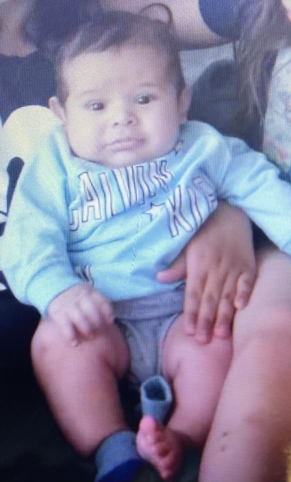 3-month-old Brandon Cuellar wears a blue sweatshirt.