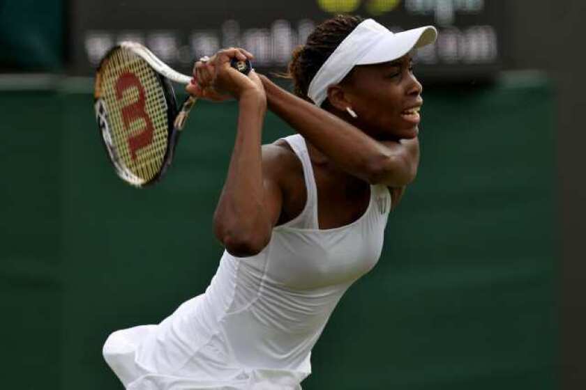 Venus Williams loses in the first round at Wimbledon on Monday.