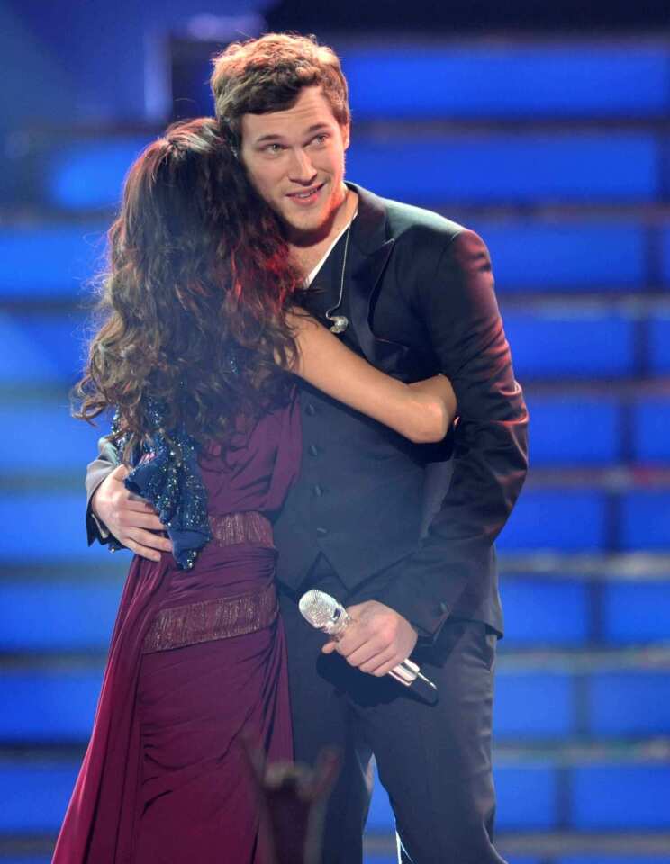 It was a great night for Phillip Phillips, but for "American Idol," maybe not so much. Phillips, a husky-voiced troubadour, conquered Season 11 as expected on Wednesday night's two-hour finale, slipping past his last competitor, 16-year-old chanteuse Jessica Sanchez. But the Fox show itself slunk to the lowest "Idol" finale ratings ever, with 20.7 million tuning in, according to preliminary figures from Nielsen. That's an alarming 29% drop compared with last season and in line with "Idol's" overall decline this year, as audiences have seemed to tire of a glut of singing shows that includes NBC's "The Voice" and Fox's own "The X Factor."