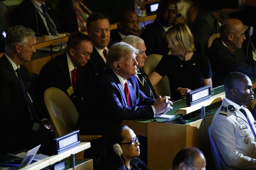 President Donald Trump listens during the the United Nations Climate Action Summit during the General Assembly, Monday, Sept. 23, 2019, in New York. From left, National Security Adviser Robert C. O'Brien, White House chief of staff Mick Mulvaney, Secretary of State Mike Pompeo, Trump, Vice President Mike Pence, and U.S. Ambassador to the United Nations Kelly Craft. (AP Photo/Evan Vucci)
