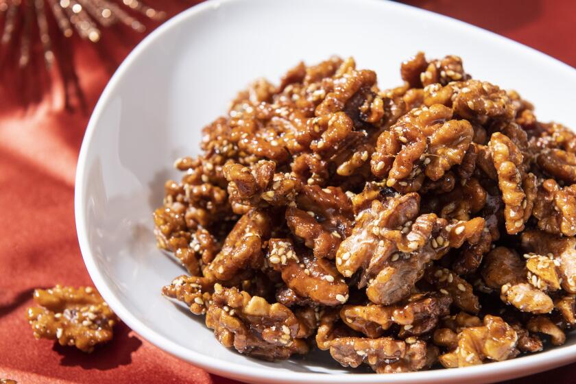 QUEENS, NY - Nov 26, 2019 - Genevieve Ko Recipes for the holidays, using ingredients from Costco. - Honeyed Sesame Walnuts