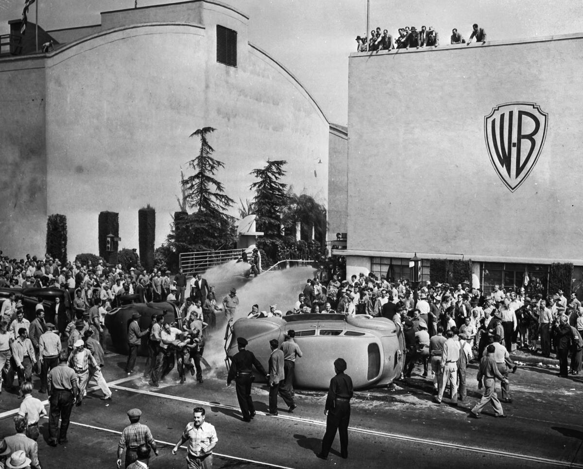 Oct. 5, 1945: Strikers and non-strikers clash outside of employee entrance to Warner Bros.  Studios in Burbank. 