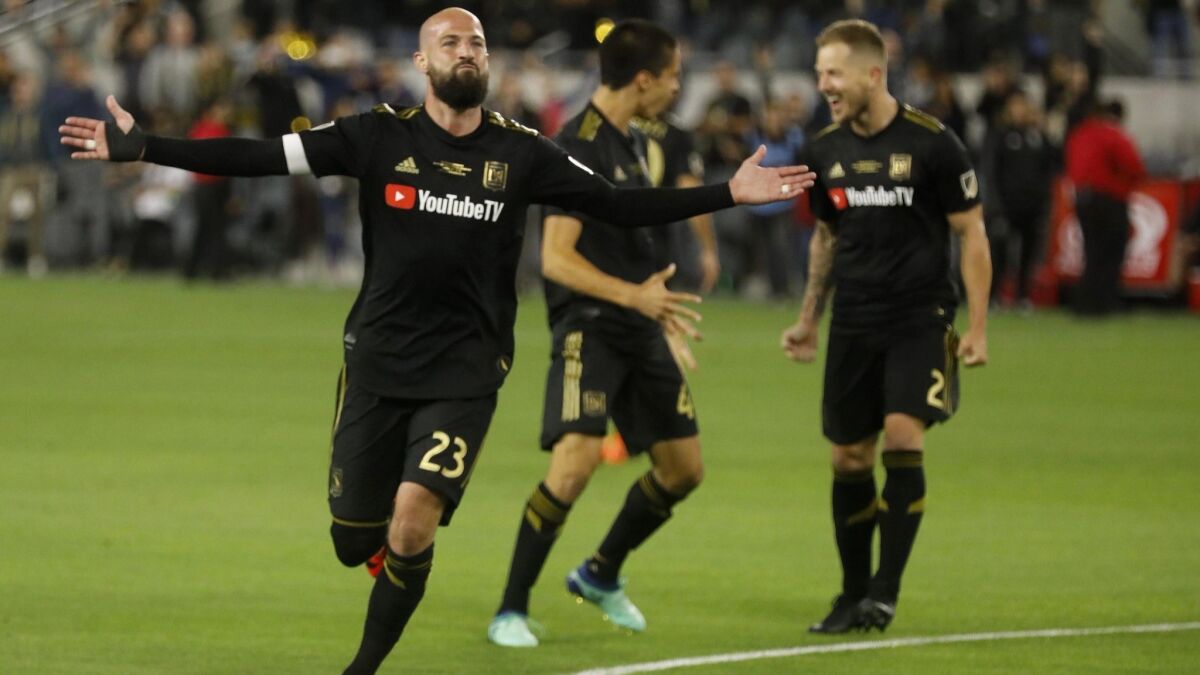 LAFC's Laurent Ciman acknowledges the cheers from the Banc of California Stadium crowd after scoring the game winning goal against Seattle on April 29.