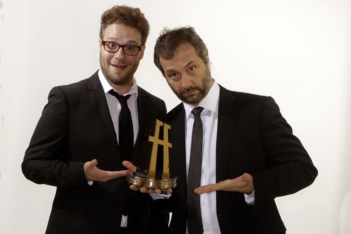 Presenter Seth Rogen and honoree Judd Apatow at the Hollywood Film Awards in 2012.