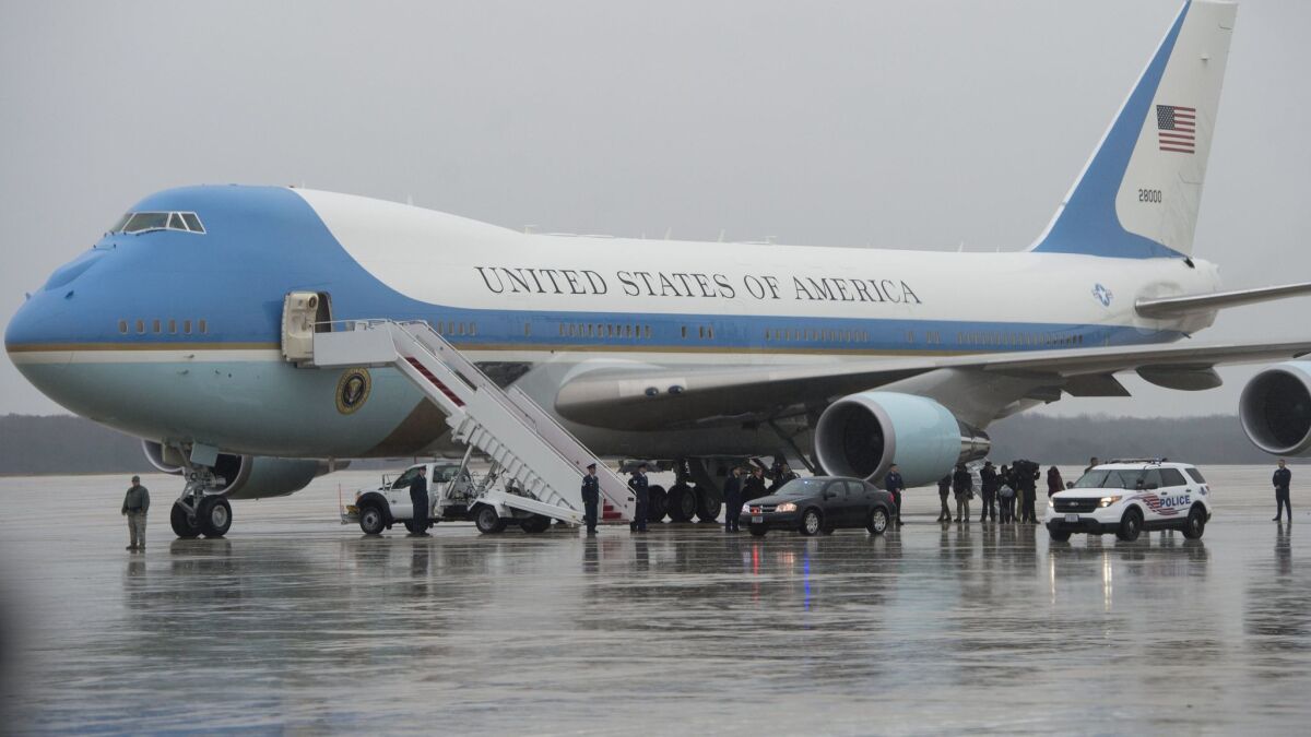 Air Force One, a heavily modified Boeing 747, is seen in Maryland in December 2016. The White House said Tuesday it had inked an informal deal worth $3.9 billion with manufacturer Boeing for two new planes.