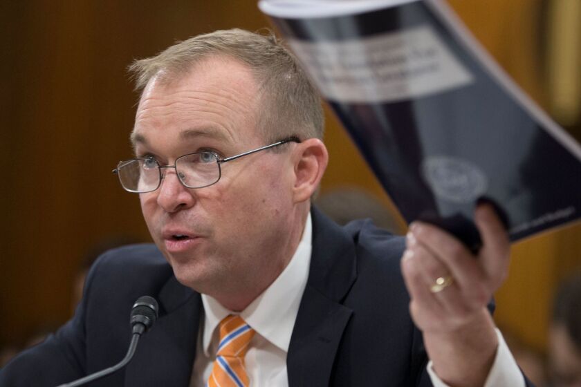 epa05989545 Office of Management and Budget (OMB) Director Mick Mulvaney holds a copy of the President's budget proposal while testifying during the Senate Budget Committee hearing on the fiscal year 2018 budget proposal of US President Donald J. Trump, on Capitol Hill in Washington, DC, USA, 25 May 2017. EPA/MICHAEL REYNOLDS ** Usable by LA, CT and MoD ONLY **