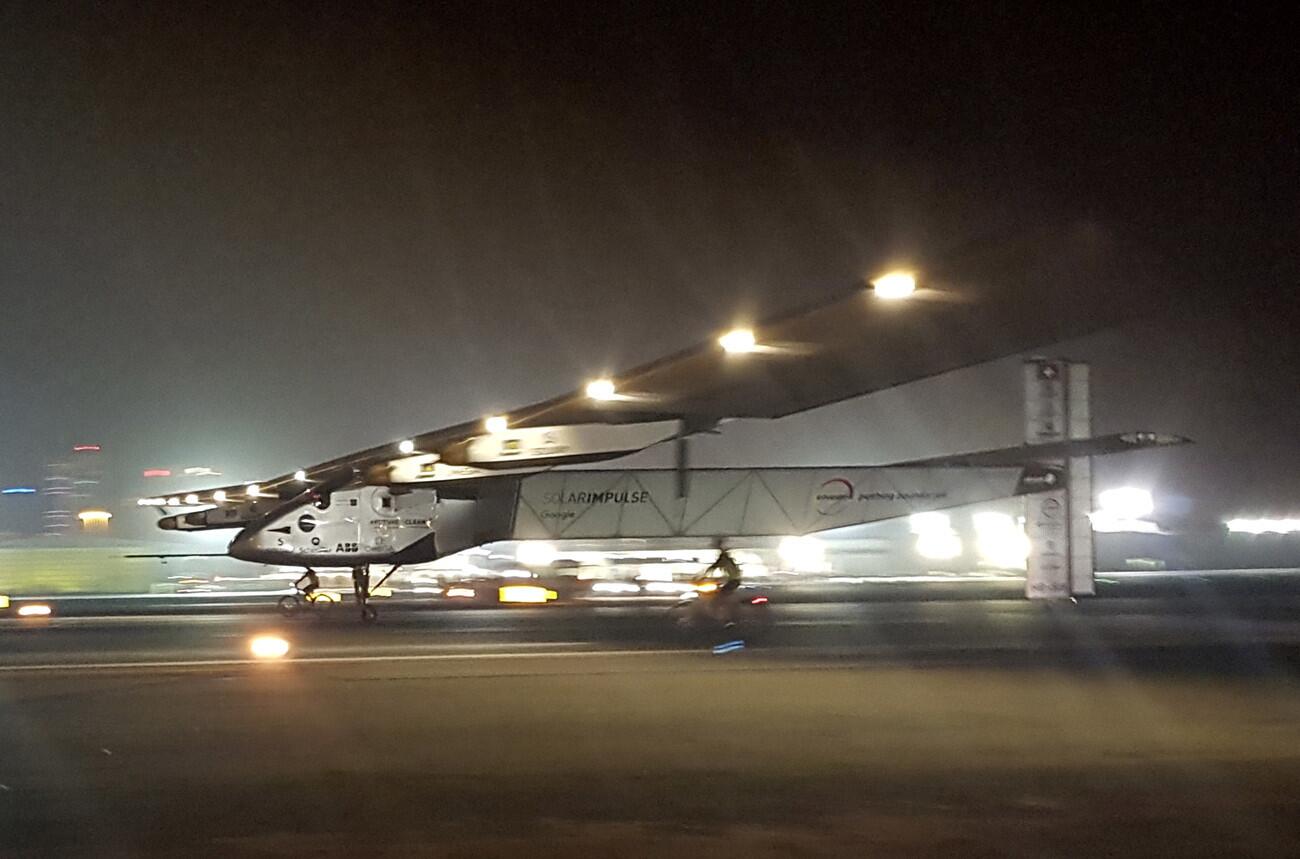 The Solar Impulse 2 plane lands in an airport in Abu Dhabi, United Arab Emirates, early on July 26, 2016, marking the historic end of the first attempt to fly around the world without a drop of fuel, powered solely by the sun’s energy.