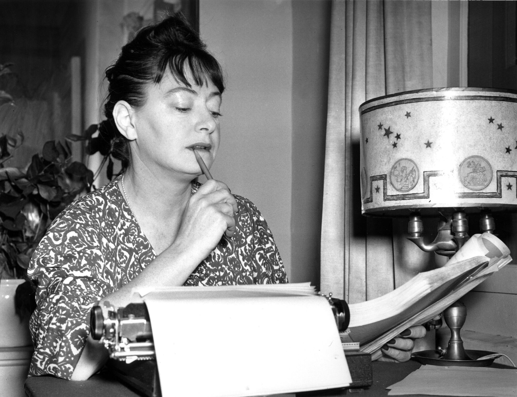 Dorothy Parker works at her typewriter in this Nov. 29, 1941 photo