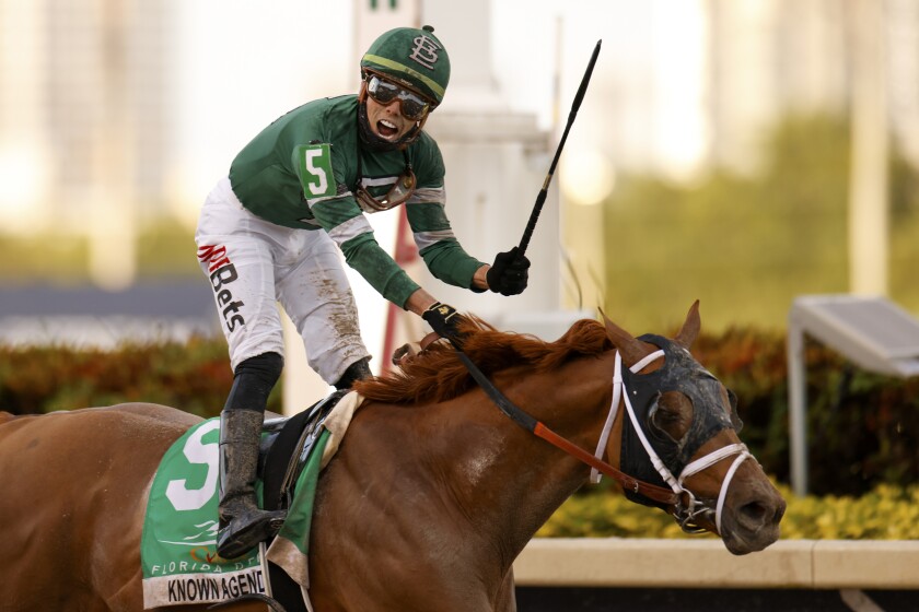 Known Agenda, ridden by Irad Ortiz Jr., wins the Florida Derby at Gulfstream Park on March 27, 2021.