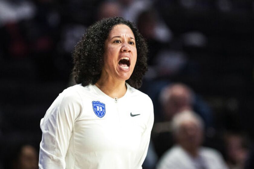 Duke coach Kara Lawson directs the team during the first half of an NCAA college basketball game against Wake Forest on Thursday, Jan. 5, 2023, in Winston-Salem, N.C. (Allison Lee Isley/The Winston-Salem Journal via AP)