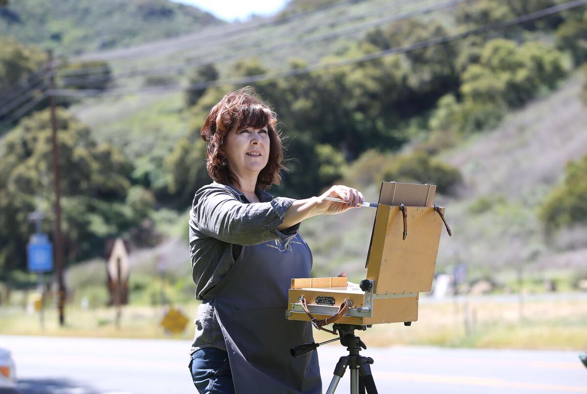 Plein air artist Wendy Wirth stays busy painting outdoor landscapes in and around Laguna Canyon in Laguna Beach.