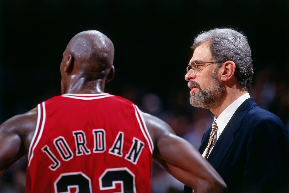 Michael Jordan and Bulls coach Phil Jackson in 1996.