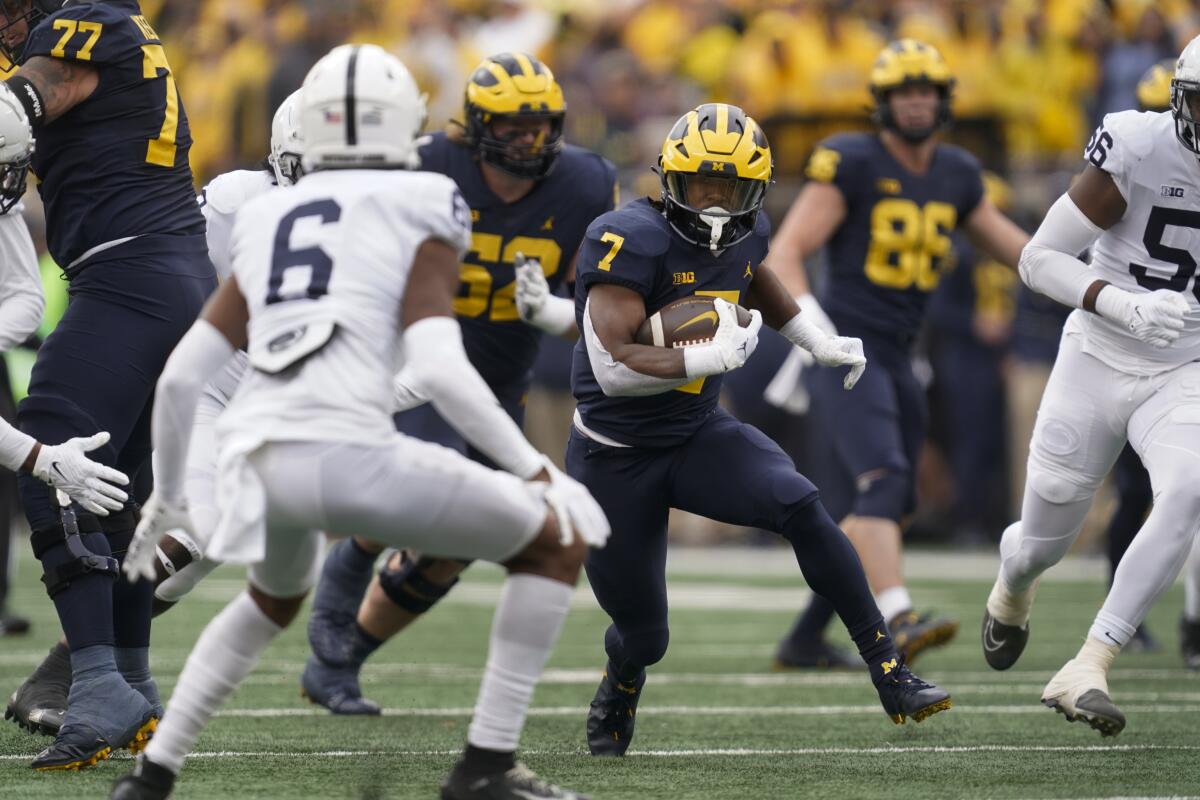 Michigan running back Donovan Edwards rushes the ball against Penn State.