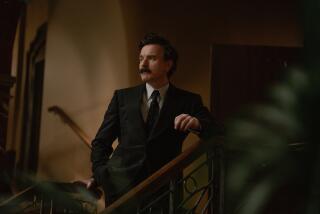 A mustachioed Russian count stands on the stairs in an old-school Moscow hotel.