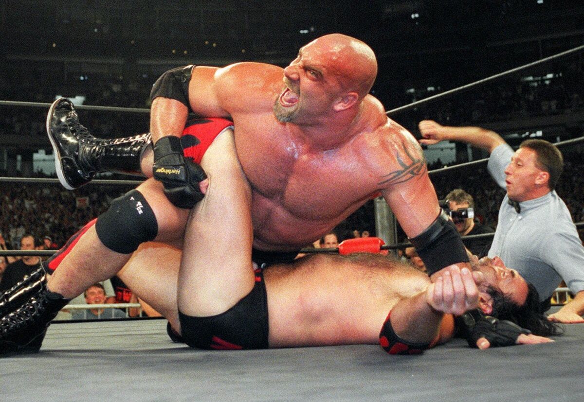 World Championship Wrestling heavyweight Bill Goldberg puts Scott Hall to the mat during a WCW match July 6, 1998 in Atlanta.