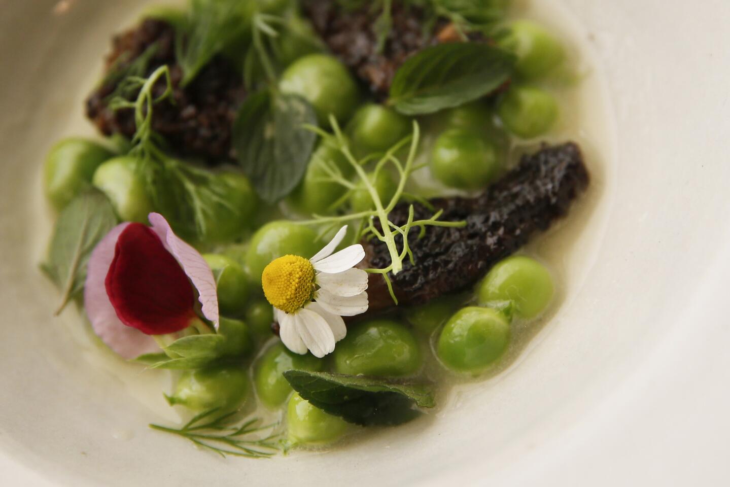 A warm salad of peas, morels and mint at Alma restaurant in downtown Los Angeles.