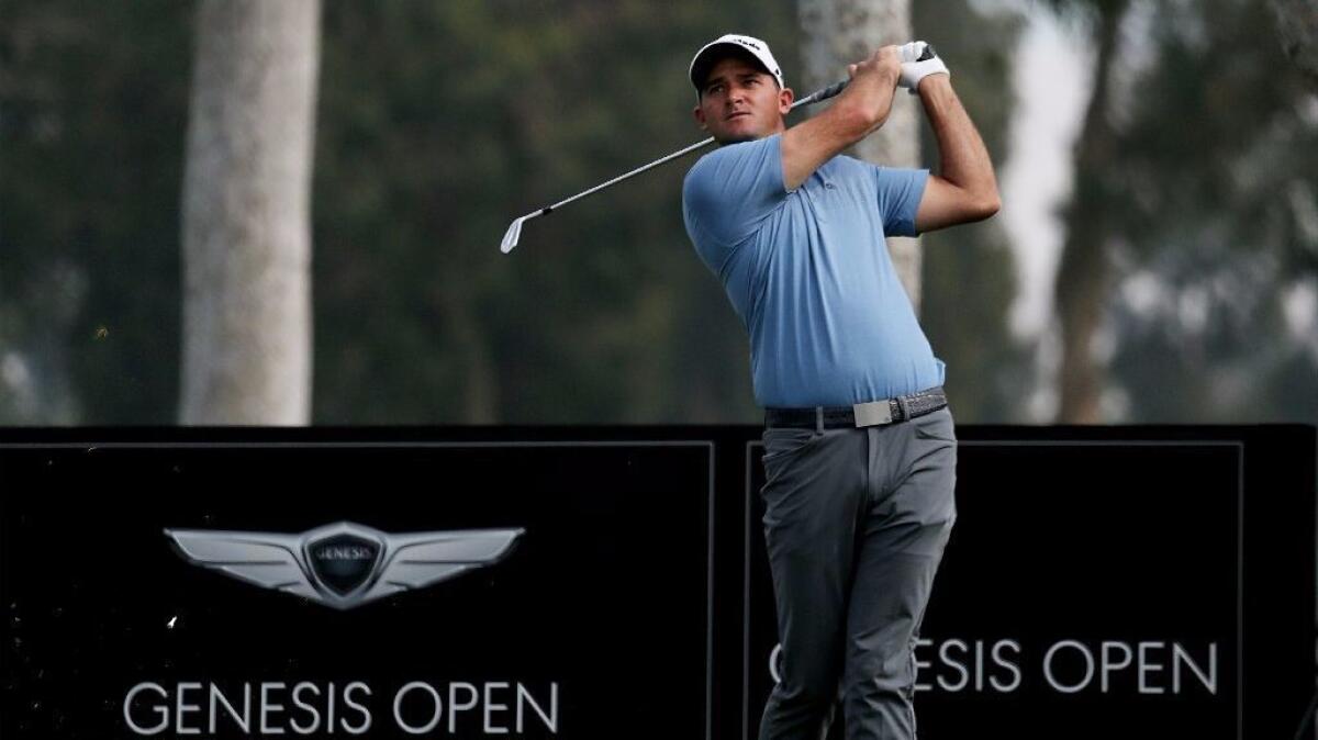 Sam Saunders hits a tee shot in the first round of the Genesis Open at Riviera Country Club in Pacific Palisades on Thursday.