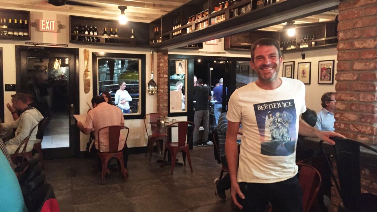 Owner Matteo Cattaneo inside his Buona Forchetta restaurant, which opened on Oct. 22 at 250 N. Coast Highway in Encinitas.