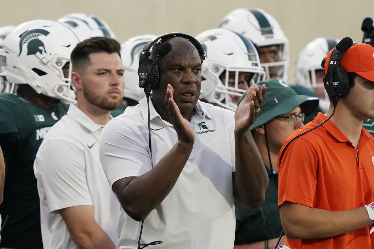 Michigan State coach Mel Tucker claps on the sideline during a game against Western Michigan on Sept. 2.