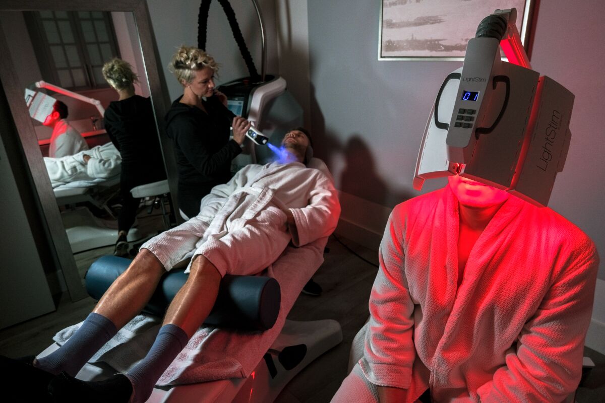 (From left to right) Josh and Mateo get cryotherapy and red light facials at Livkraft in La Jolla.