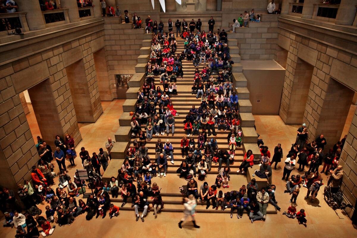 A crowd gathers in the Philadelphia Museum of Art for the drill team's performance.