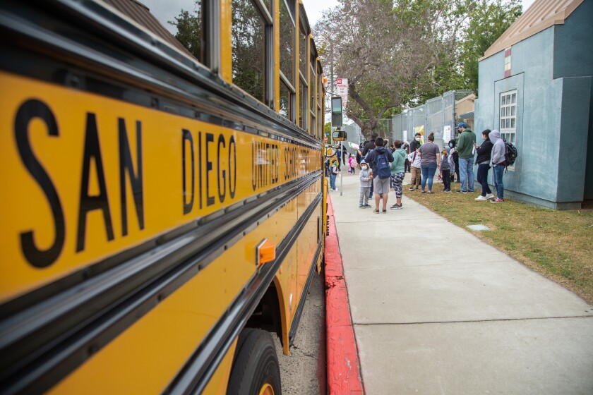 A San Diego Unified School bus arrives at Perkins K-8 on April 12, 2021 in San Diego.