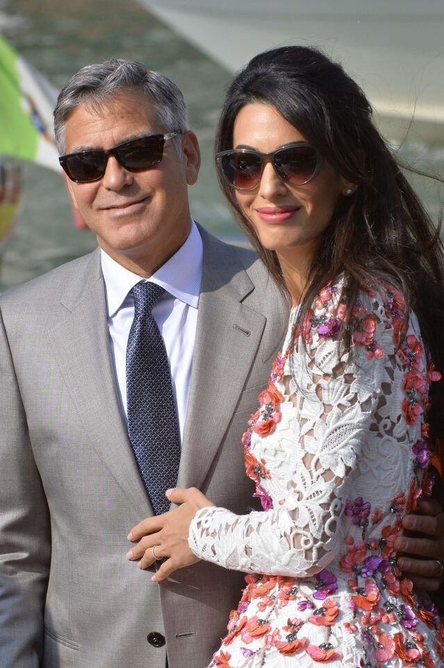 George Clooney and Amal Alamuddin out in Venice on Sunday.