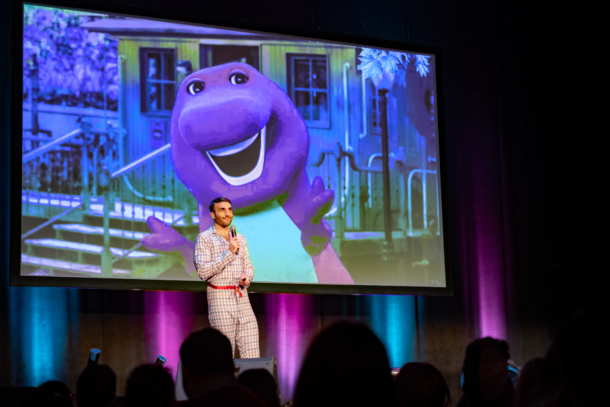 Rob Anderson on stage for his one-man show "Are You Afraid of the '90s?"