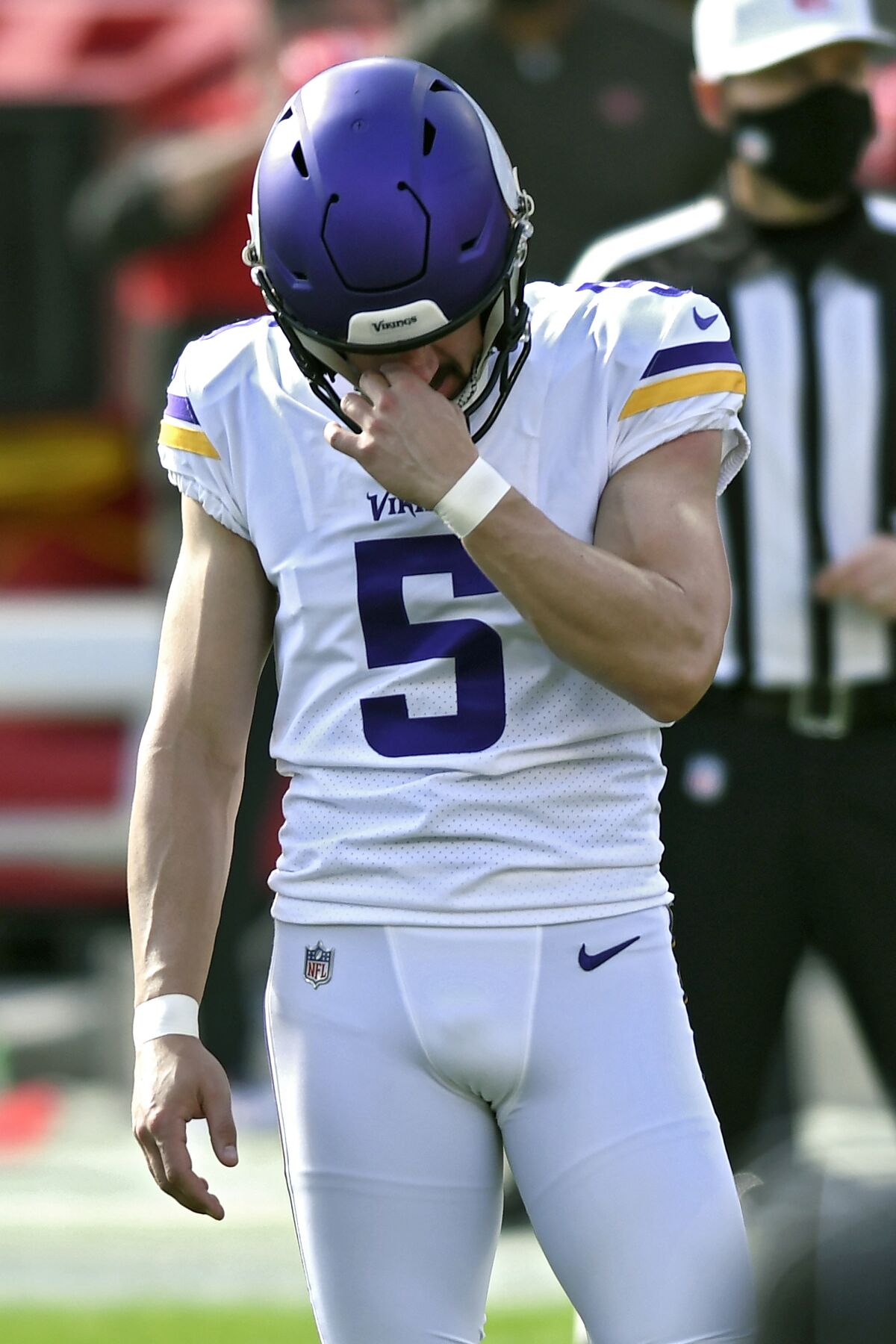 Minnesota Vikings' Dan Bailey (5) reacts after missing a field goal against the Tampa Bay Buccaneers during the first half of an NFL football game Sunday, Dec. 13, 2020, in Tampa, Fla. (AP Photo/Jason Behnken)